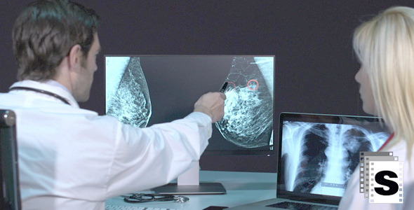 Doctors Analyzing Mastography X-ray Doctors Analyzing Mastography X-ray