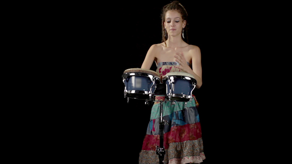 Female Percussion Drummer Performing With Bongos 1 Female Percussion Drummer Performing With Bongos 1