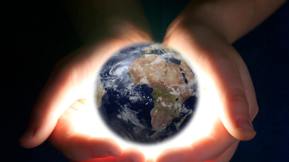 Boy Holding Earth In Her Hands Boy Holding Earth In Her Hands