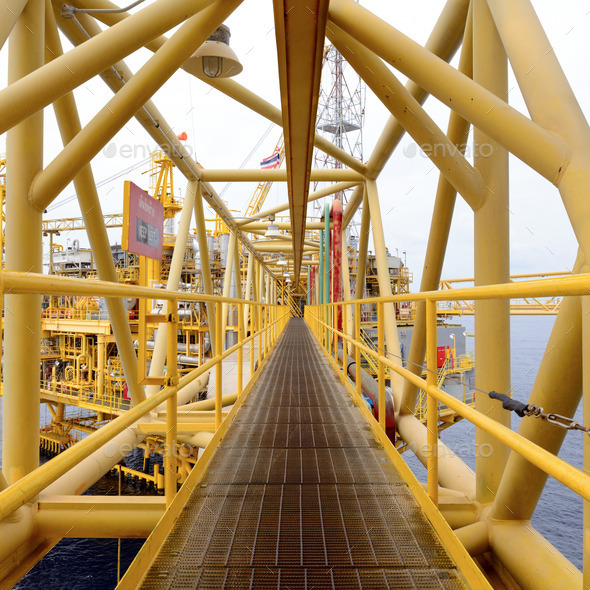 the yellow pathway bridge of offshore oil rig platform (Misc) Photo Download