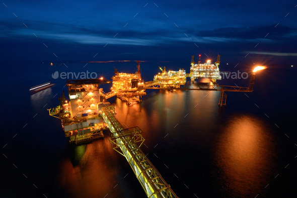 The large offshore oil rig platform at night in the gulf of thailand (Misc) Photo Download