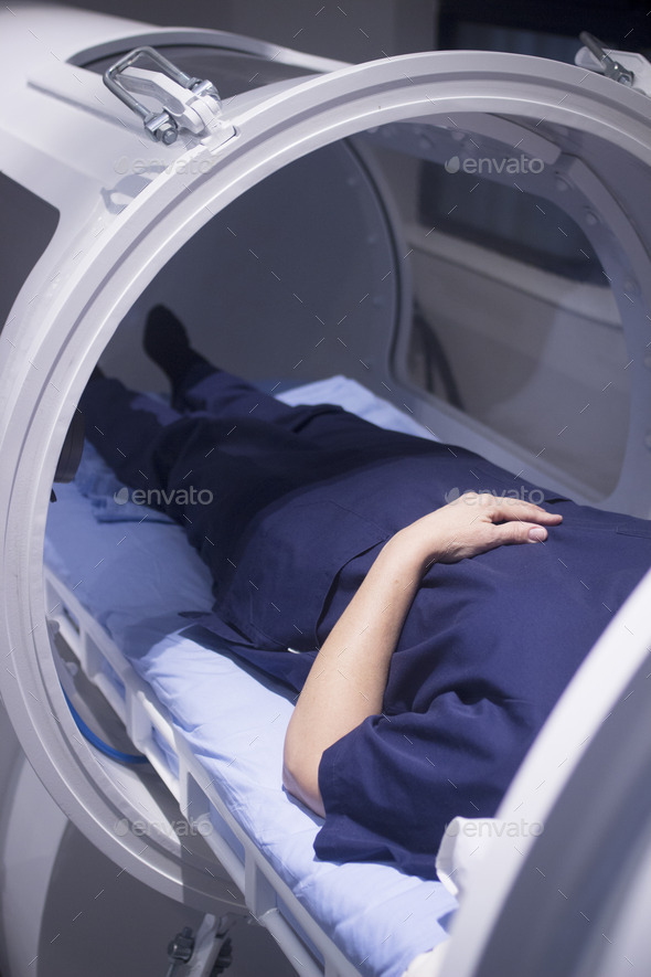 Female patient in oxygen hyperbaric chamber HBOT (Misc) Photo Download