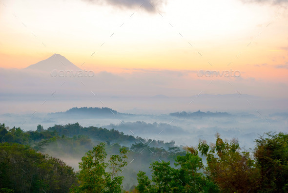 Sunrise over Merapi volcano and Borobudur temple, Indonesia (Misc) Photo Download