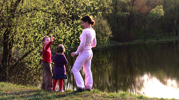 Mother With Children On Spring Pond Mother With Children On Spring Pond
