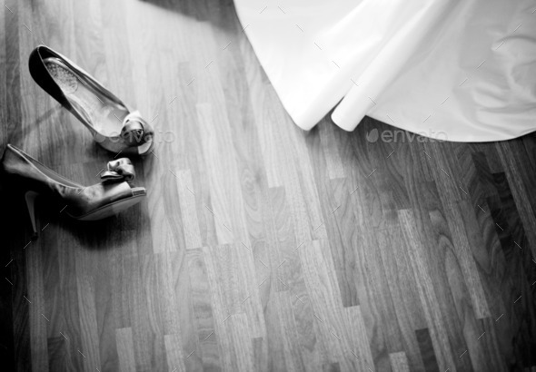 Wedding white dress and bridal shoes of bride on floor (Misc) Photo Download