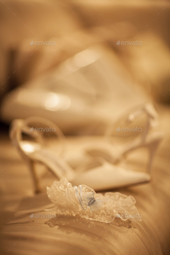 Bridal garter belt lingerie wedding shoe of bride on bed (Misc) Photo Download