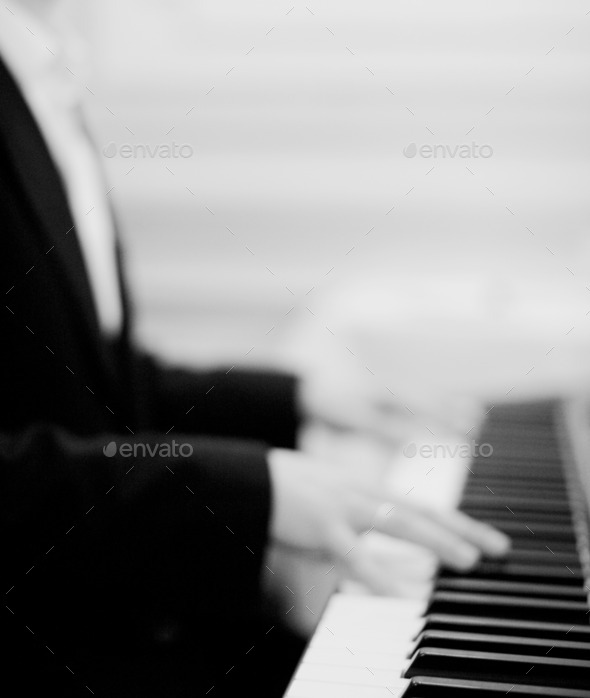 Pianist playing piano in wedding marriage party