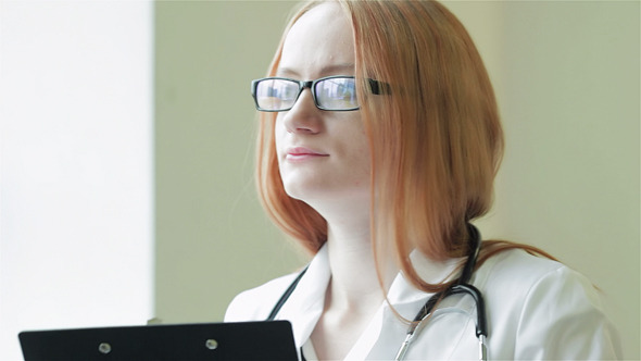 Close-Up Of A Doctor With A Diagnosis Close-Up Of A Doctor With A Diagnosis