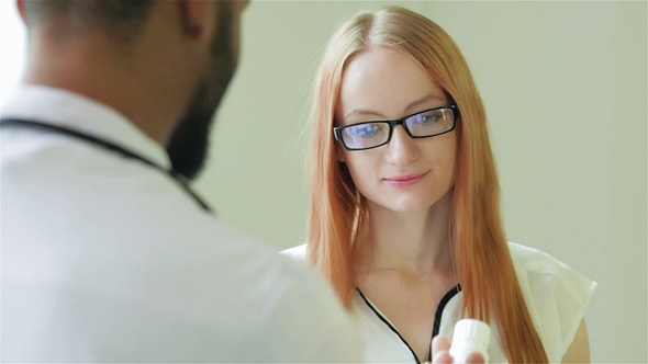 Doctor Holding A New Drug Doctor Holding A New Drug