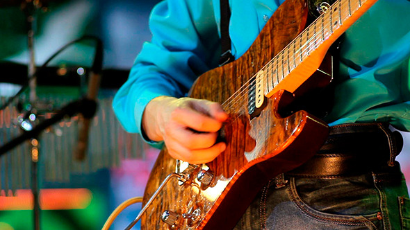 Man Playing Guitar Man Playing Guitar