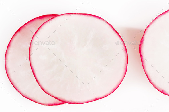 sliced red radish on white background (Misc) Photo Download