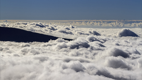 Clouds Over the Volcano Clouds Over the Volcano