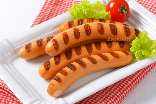 Grilled Vienna sausages on white porcelain plate (Misc) Photo Download