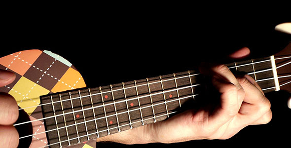 Playing Ukulele Playing Ukulele