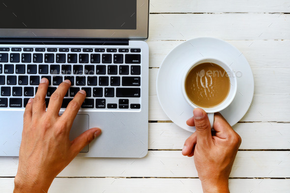 laptop with cup of coffee and hand (Misc) Photo Download