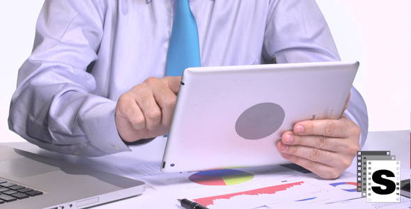 Businessman Using Tablet Businessman Using Tablet