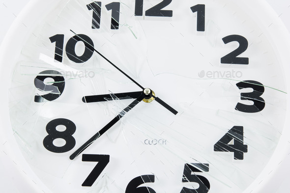 White clock is broken glass isolated