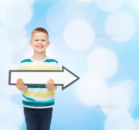 smiling little boy with blank arrow pointing right (Misc) Photo Download