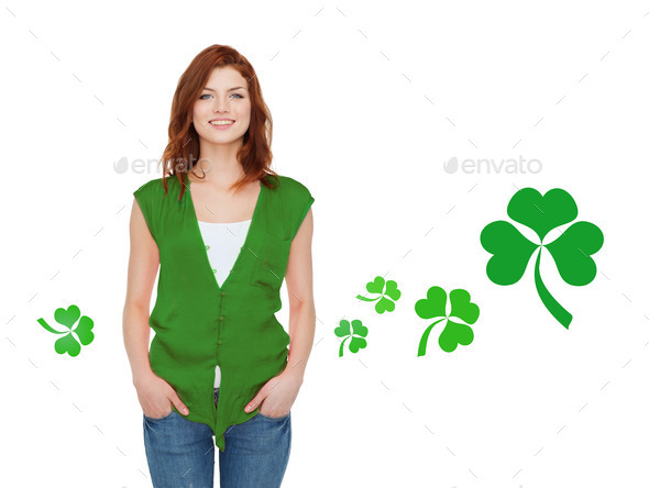 smiling teenage girl in green vest with shamrock (Misc) Photo Download