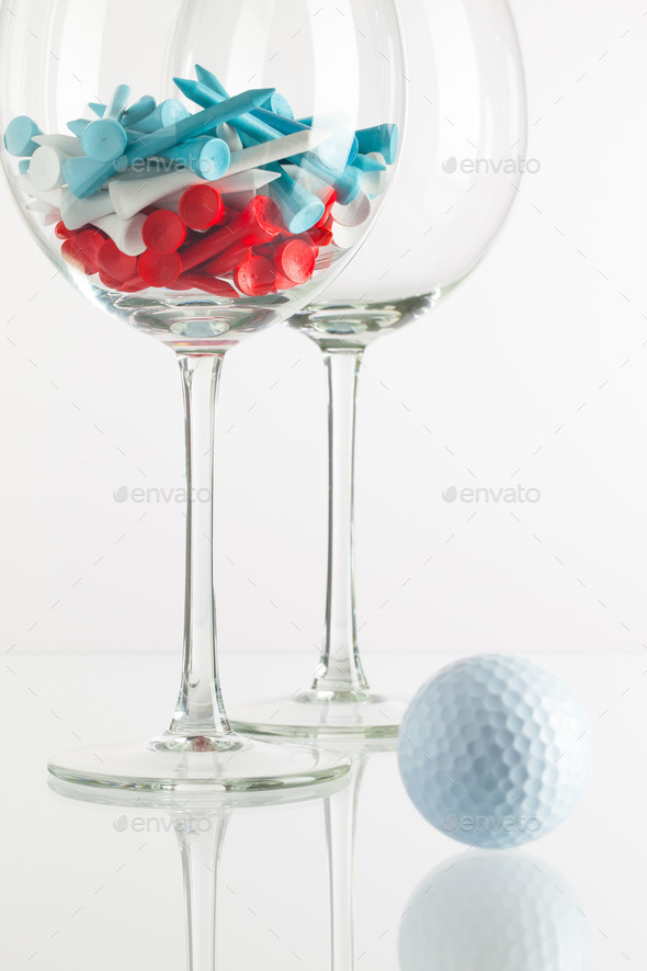 Two glasses of wine and golf equipments (Misc) Photo Download