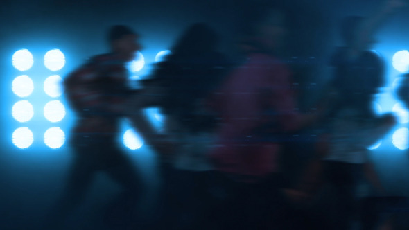 Running Crowd Hurrying Fans in the Night Light Running Crowd Hurrying Fans in the Night Light