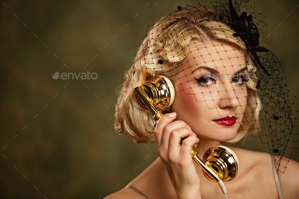 Lovely woman with a phone. Retro portrait (Misc) Photo Download