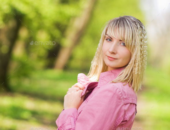 Beautiful young woman outdoors (Misc) Photo Download