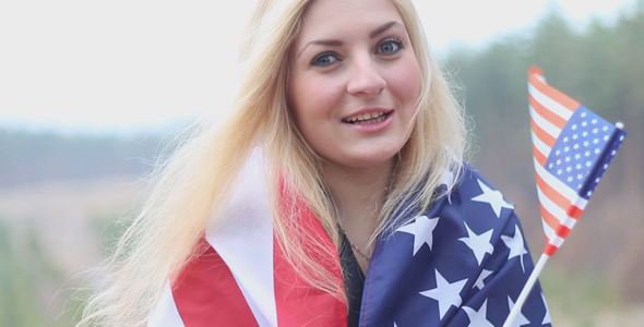 VideoHive Girl With a American Flag Talking 10094447 VideoHive Girl With a American Flag Talking 10094447