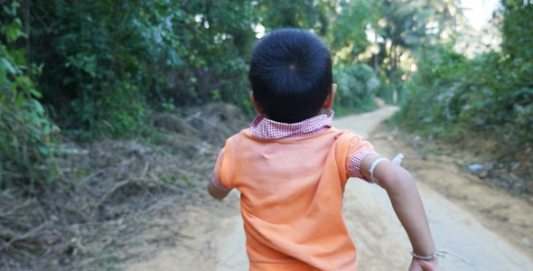 Poor Kid Running On Dirt Road Poor Kid Running On Dirt Road