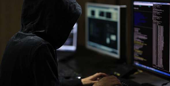 Hacker in Hood Typing on Keyboard 2 Hacker in Hood Typing on Keyboard 2