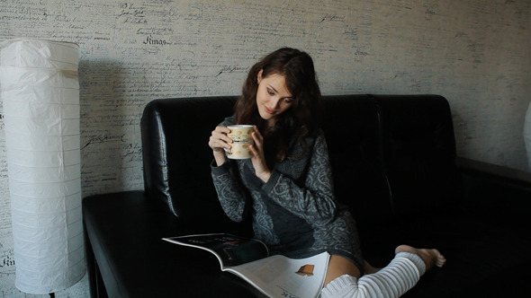 VideoHive Woman Reading Magazine And Drinking Coffee 10108812 VideoHive Woman Reading Magazine And Drinking Coffee 10108812