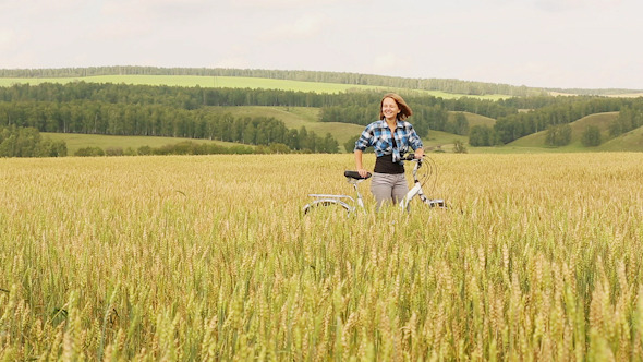 VideoHive Girl With Bicycle 10 10119479 VideoHive Girl With Bicycle 10 10119479