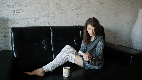 VideoHive Beautiful Girl Reading Book 10121580 VideoHive Beautiful Girl Reading Book 10121580