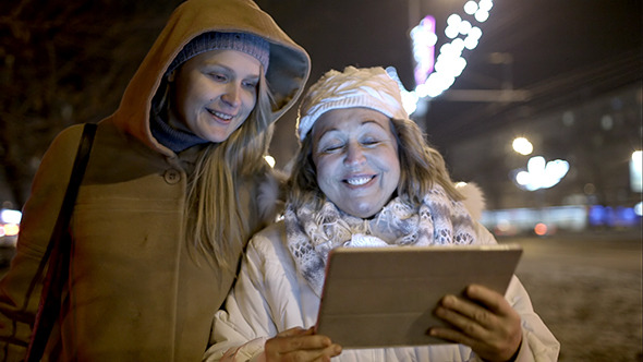 VideoHive Two Women Walking With Pad Outdoor In The Cold 10124997 VideoHive Two Women Walking With Pad Outdoor In The Cold 10124997