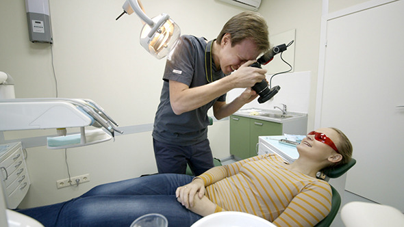 VideoHive Dentist Taking Pictures Of Womans Smile 10125100 VideoHive Dentist Taking Pictures Of Womans Smile 10125100