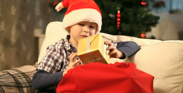 Boy with Christmas presents Boy with Christmas presents