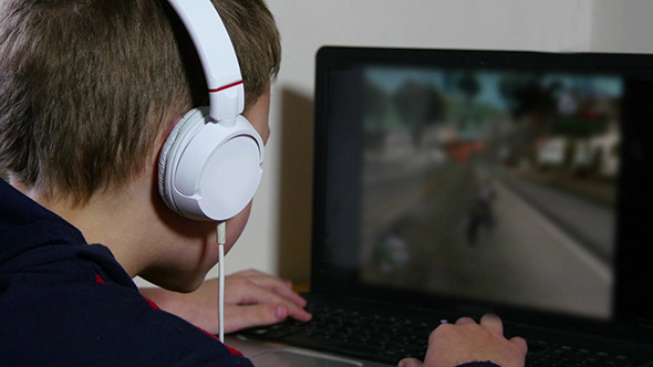 VideoHive Young Boy Playing Video Games 10129348 VideoHive Young Boy Playing Video Games 10129348