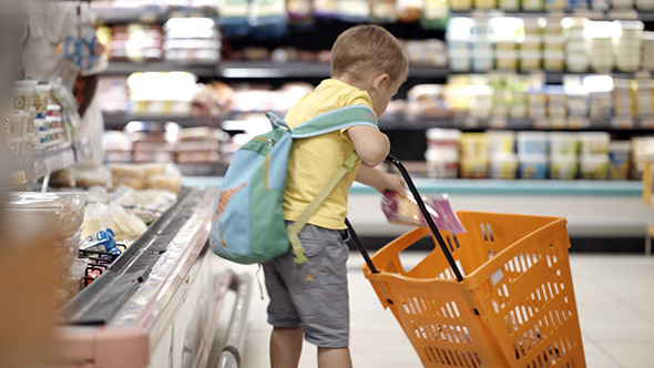 VideoHive Boy Putting Products Into Shopping Cart 10133601 VideoHive Boy Putting Products Into Shopping Cart 10133601