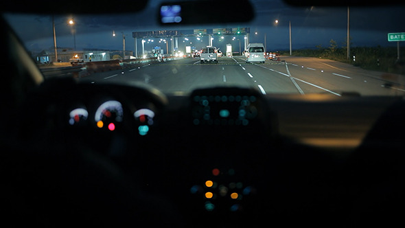 Car At The Toll Collection Point At Night Car At The Toll Collection Point At Night
