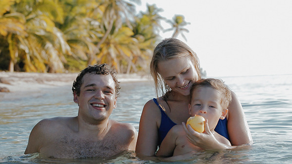 VideoHive Family Of Three Relaxing In Sea Water In Tropics 10133661 VideoHive Family Of Three Relaxing In Sea Water In Tropics 10133661