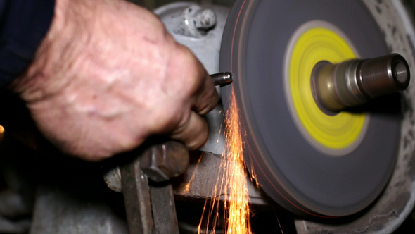 VideoHive Filing a Piece of Iron with a Filing Machine 10134764 VideoHive Filing a Piece of Iron with a Filing Machine 10134764
