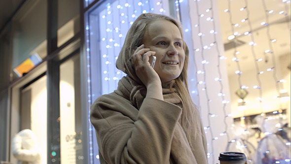 VideoHive Woman Talking On Phone And Drinking Coffee 10143499 VideoHive Woman Talking On Phone And Drinking Coffee 10143499
