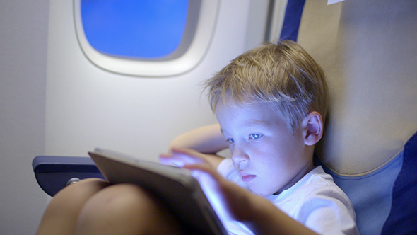 VideoHive Bored Or Tired Boy In Plane Using Tablet Computer 10150133 VideoHive Bored Or Tired Boy In Plane Using Tablet Computer 10150133