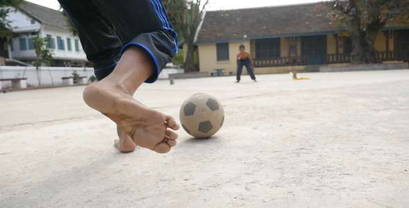 Kid Doing Kick With Ball Kid Doing Kick With Ball