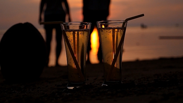 VideoHive Two Glasses of Soft Drink at Sunset 10155008 VideoHive Two Glasses of Soft Drink at Sunset 10155008