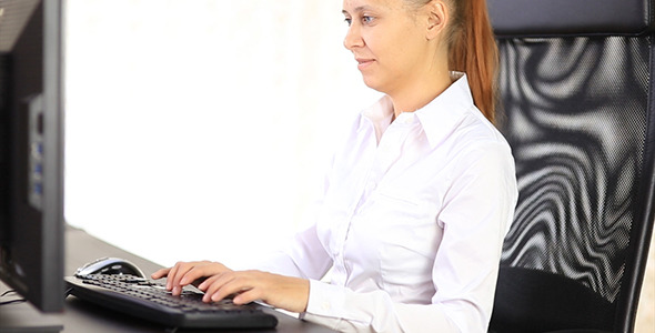 VideoHive Woman Working on a Computer 10156249 VideoHive Woman Working on a Computer 10156249