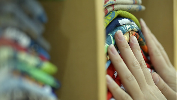 VideoHive Woman Looking Over The Pile Of Materials In Shop 10156877 VideoHive Woman Looking Over The Pile Of Materials In Shop 10156877