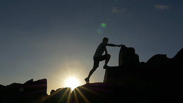 VideoHive Climbing a Rocky Mountain at Sunrise 10159202 VideoHive Climbing a Rocky Mountain at Sunrise 10159202