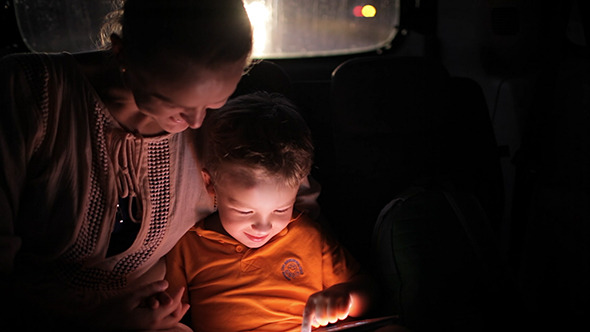 VideoHive Little Boy Using Tablet Pc During Car Travel 10162325 VideoHive Little Boy Using Tablet Pc During Car Travel 10162325