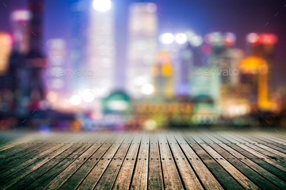 Blurred city lights and office buildings